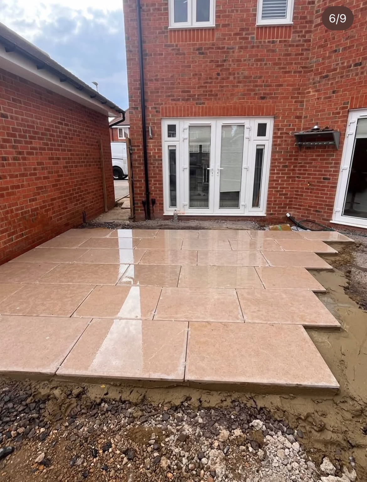Porcelain paving being laid at the rear of the house