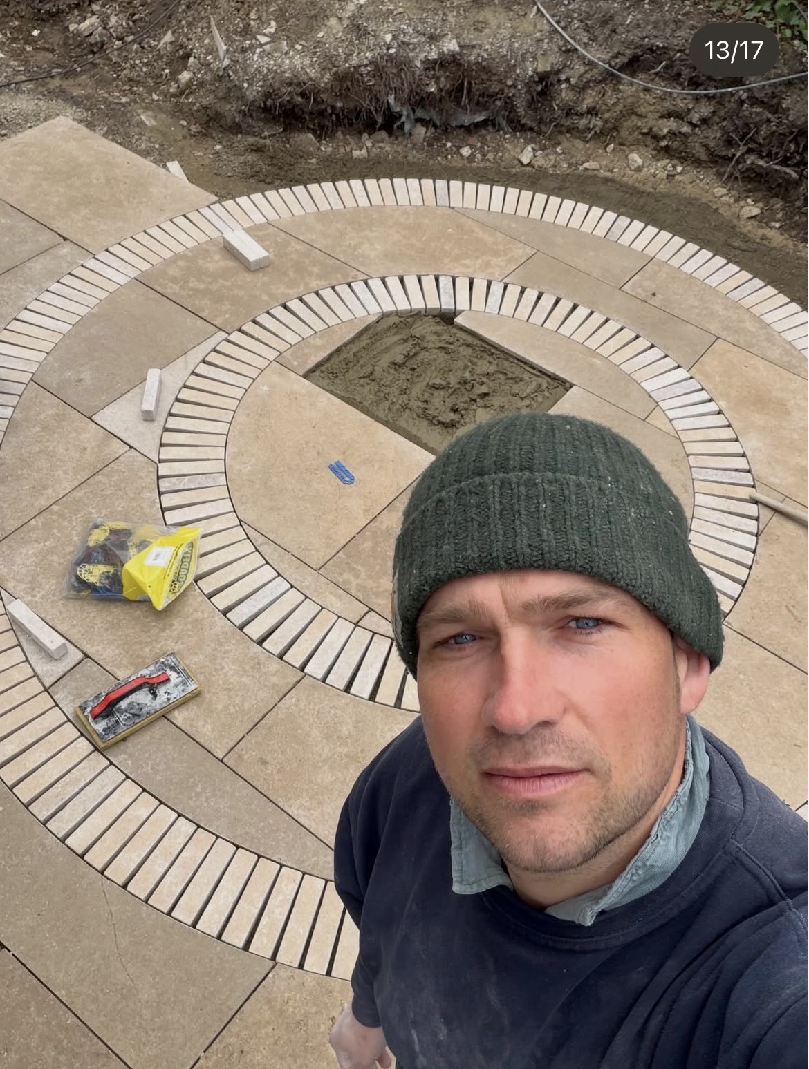 Ed during installation of the circular clay paver detail
