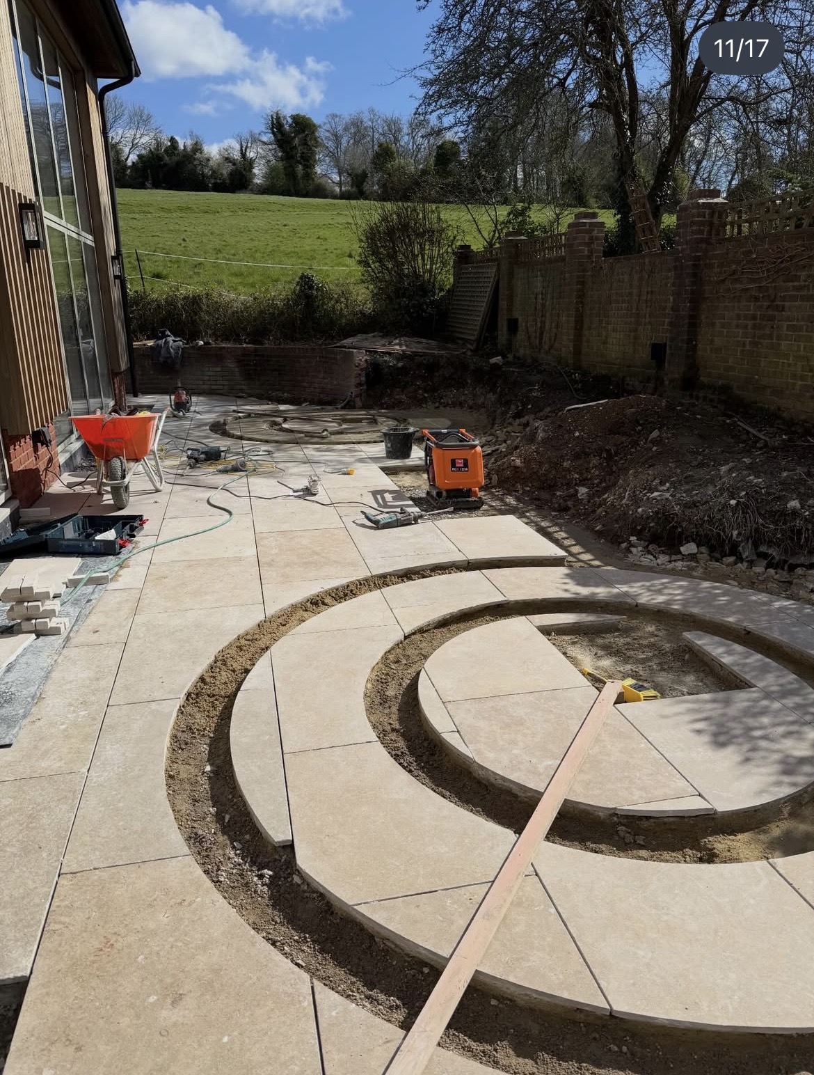 Circular paving pattern being laid during construction